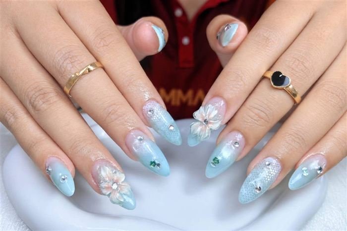 Aqua ombre almond nails with 3D blossoms and crystals