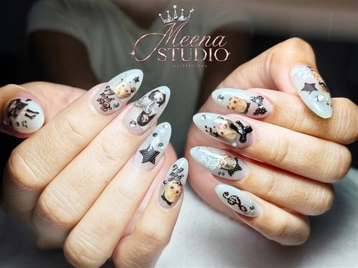 Milky white almond nails with doll stickers, polka dot stars, bows and crystals