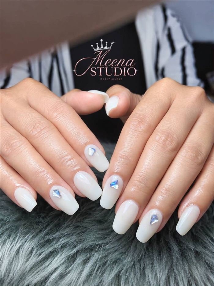 Milky white coffin nails with iridescent gems